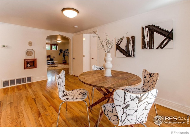 dining room with light hardwood / wood-style flooring