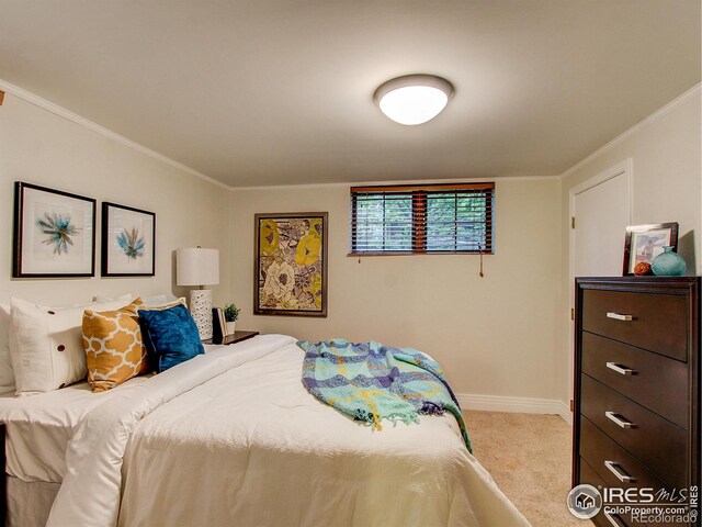 carpeted bedroom with crown molding