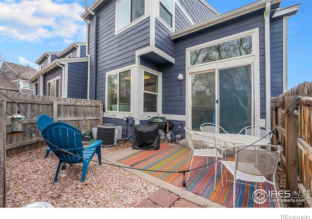 view of patio / terrace featuring cooling unit