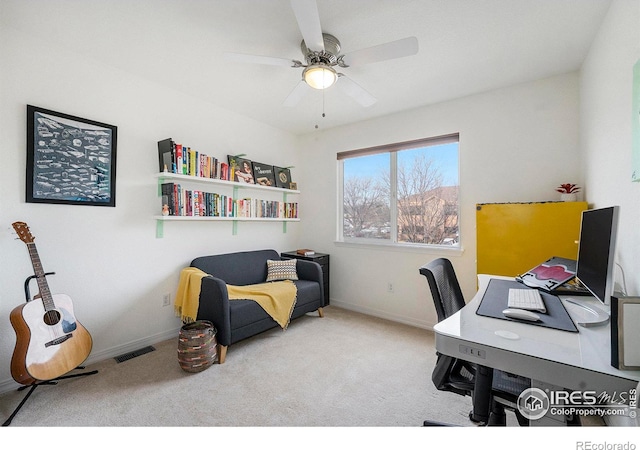 office area featuring ceiling fan and carpet flooring