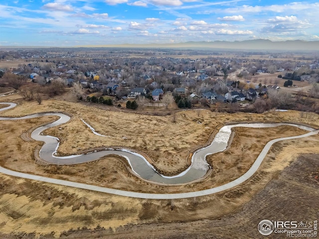 bird's eye view with a residential view and a mountain view