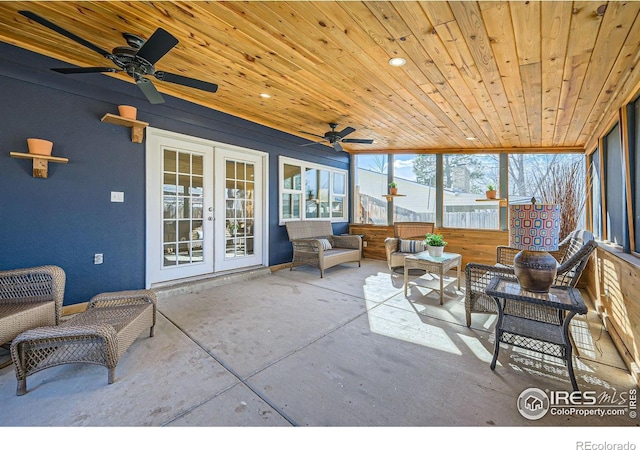 sunroom / solarium with french doors and wooden ceiling