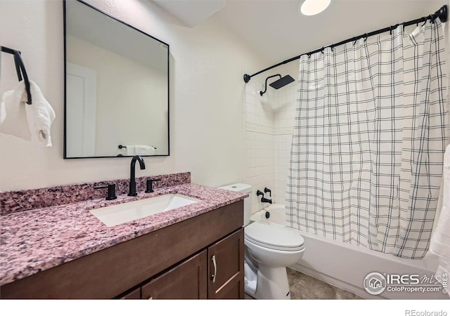 bathroom featuring vanity, shower / bath combination with curtain, and toilet