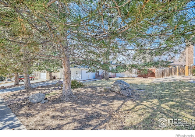 view of yard featuring fence