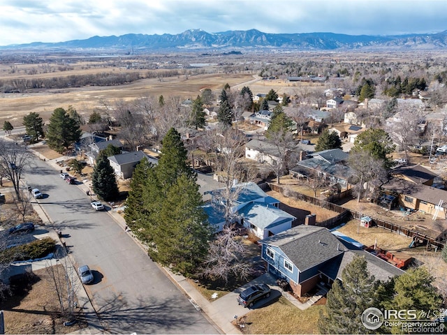 aerial view featuring a mountain view and a residential view