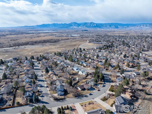 bird's eye view featuring a mountain view and a residential view