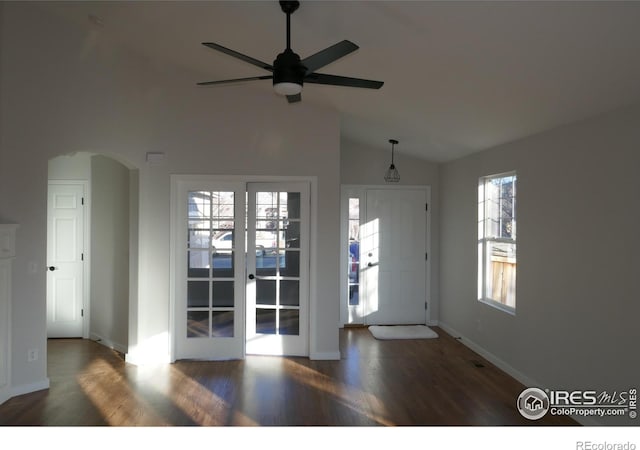 entryway with ceiling fan, lofted ceiling, and dark hardwood / wood-style flooring