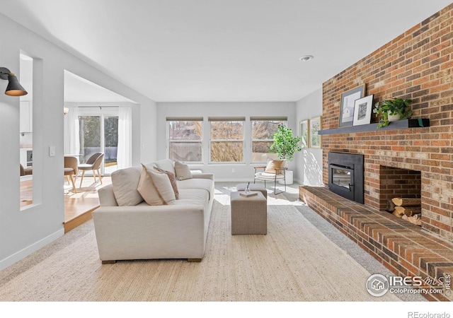 living room featuring a fireplace