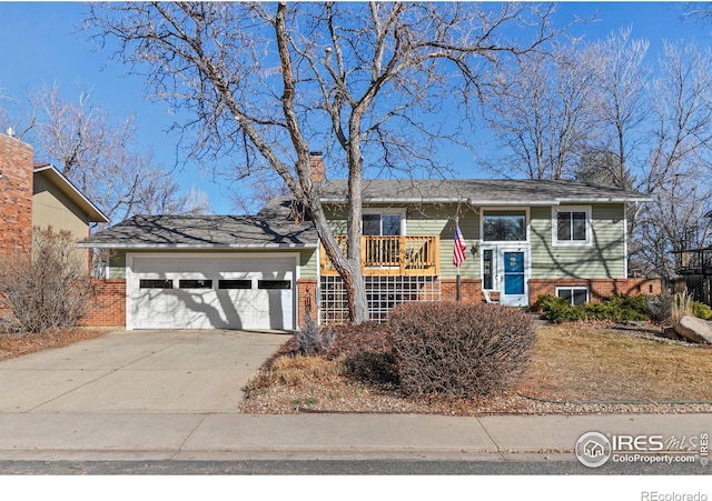 view of front of property featuring a garage