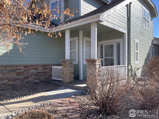 entrance to property with covered porch