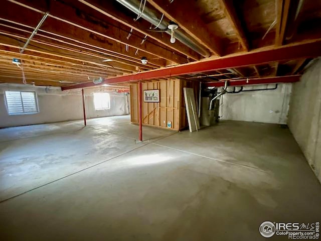 basement featuring plenty of natural light