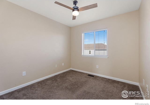 unfurnished room featuring ceiling fan and carpet floors