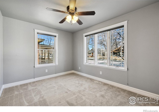 1005 Laporte Ave, Fort Collins, CO 80521 - spare room featuring ceiling fan and light colored carpet