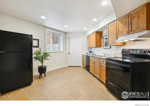1005 Laporte Ave, Fort Collins, CO 80521 - kitchen featuring sink, light tile patterned floors, black appliances, and a textured ceiling