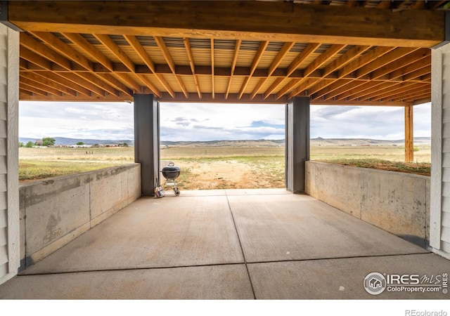 view of patio with a rural view