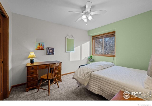 bedroom featuring ceiling fan and carpet flooring