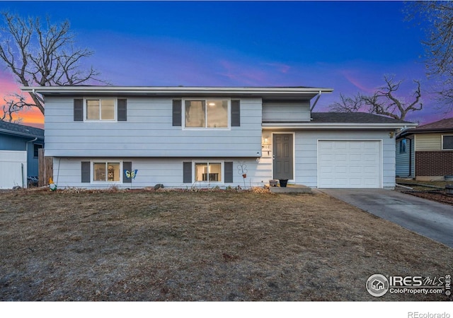 split level home featuring a garage