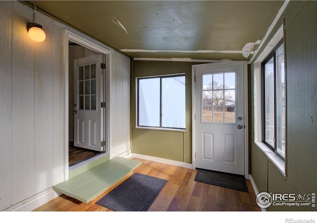 doorway to outside with hardwood / wood-style flooring