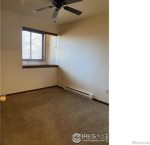 carpeted empty room with ceiling fan and a baseboard radiator