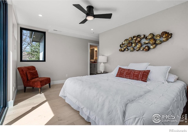 bedroom featuring ceiling fan and light wood-type flooring