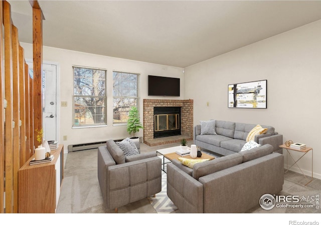 living room with a baseboard heating unit, light colored carpet, and a fireplace