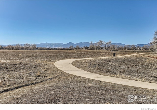 view of mountain feature with a rural view