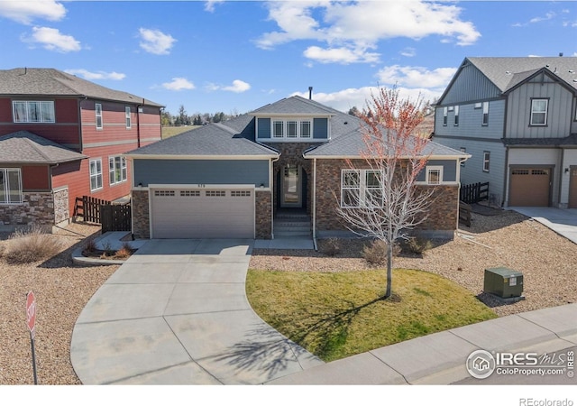 979 Stagecoach Dr, Lafayette, CO 80026 - view of front facade featuring driveway and an attached garage