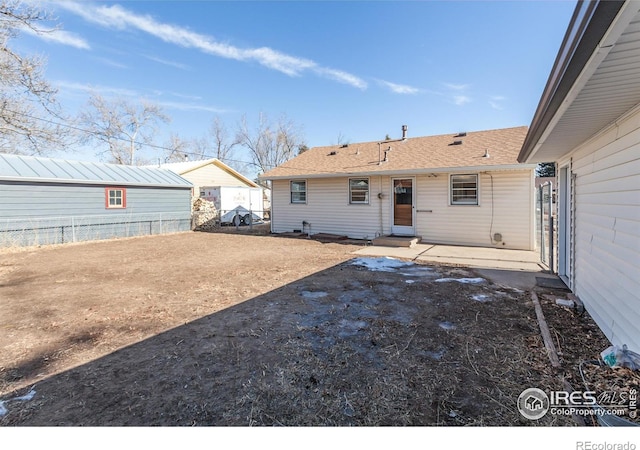 back of property featuring a patio area