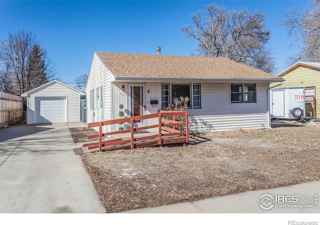 bungalow-style house with an outbuilding and a garage