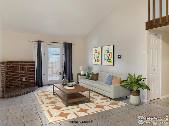 living room with light tile patterned floors and high vaulted ceiling