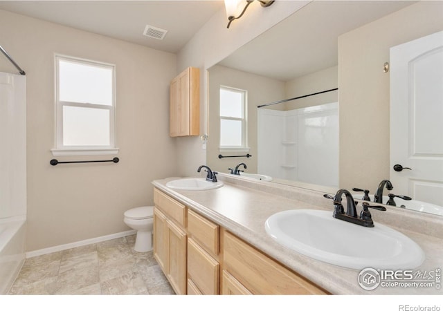 full bathroom with vanity,  shower combination, and toilet