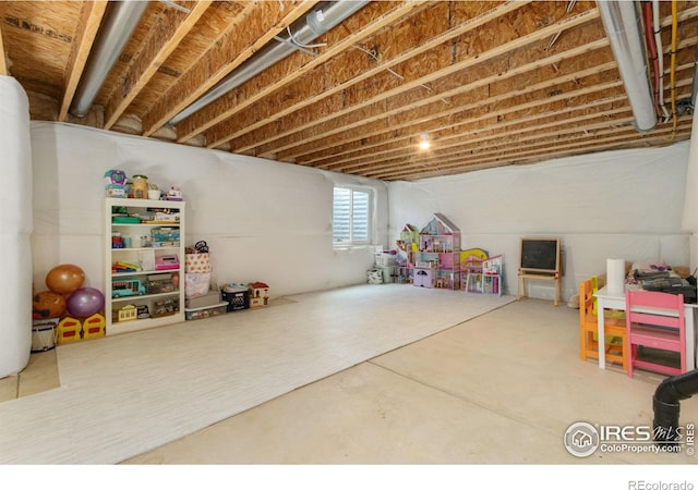 playroom with concrete flooring