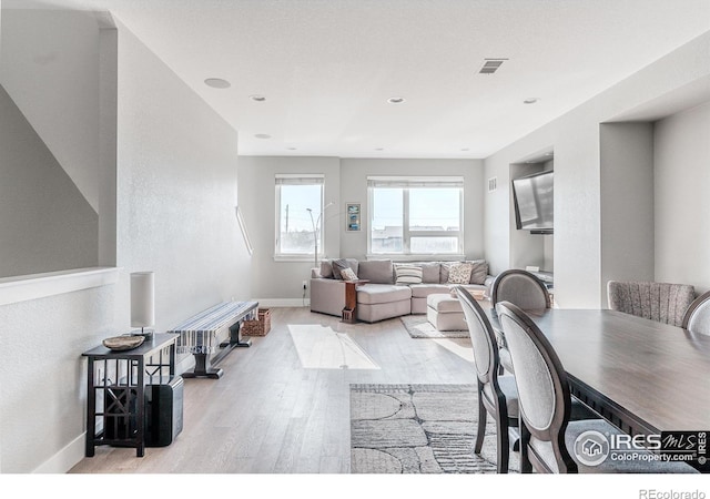 dining room with light hardwood / wood-style floors