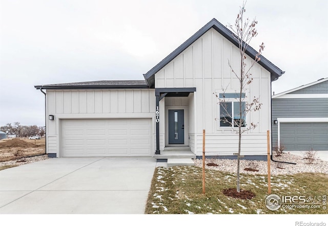 modern inspired farmhouse featuring a garage