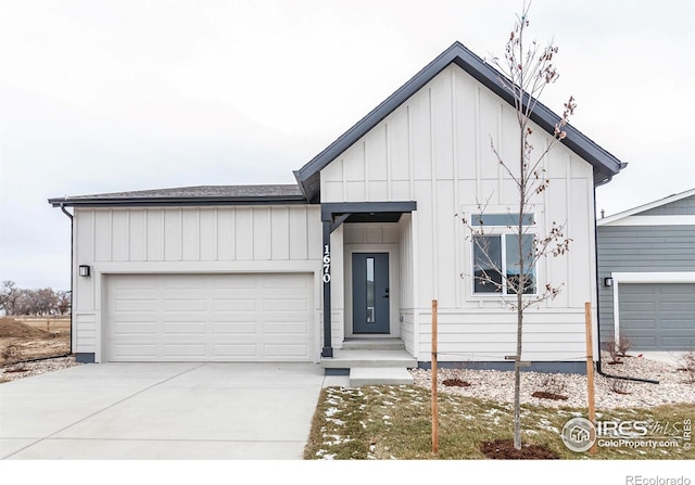 modern farmhouse featuring a garage