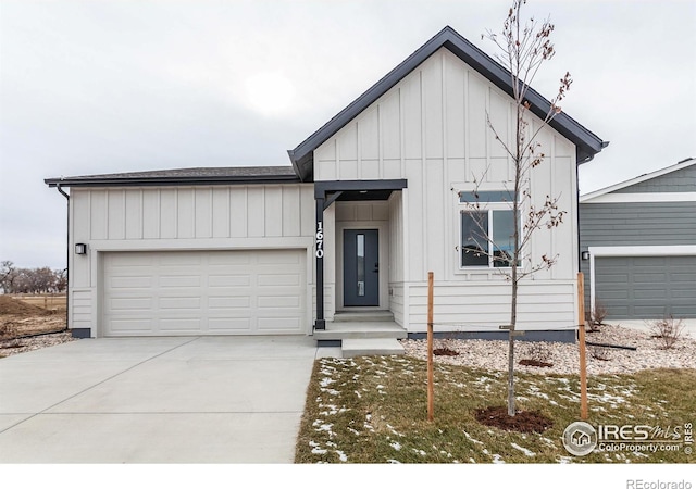 modern farmhouse style home featuring a garage