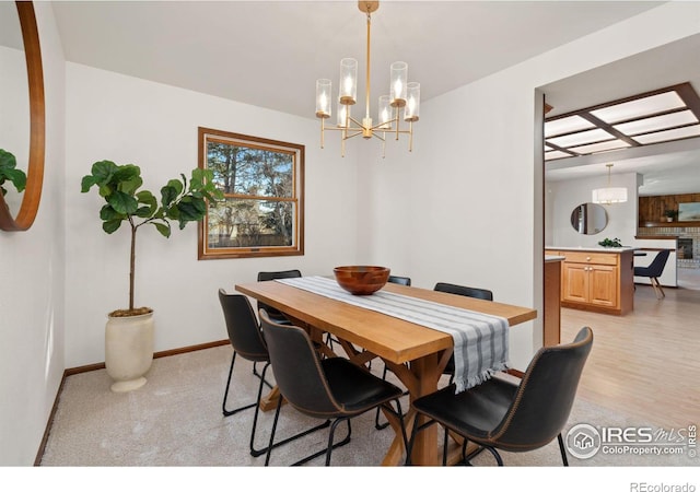 dining area featuring a chandelier