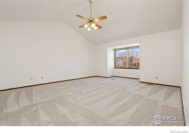 interior space with lofted ceiling and ceiling fan