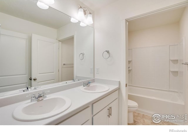 full bathroom with shower / tub combination, vanity, and toilet