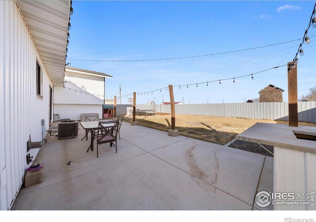 view of patio with cooling unit