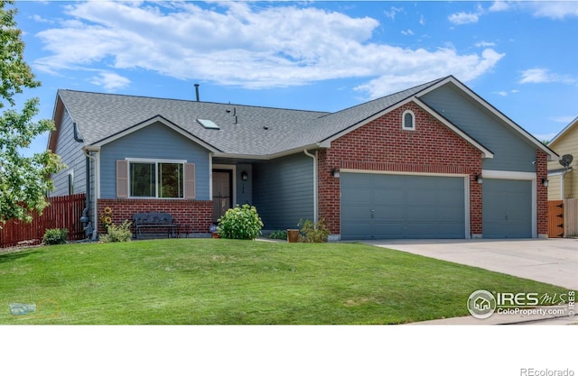 ranch-style home with a garage and a front yard