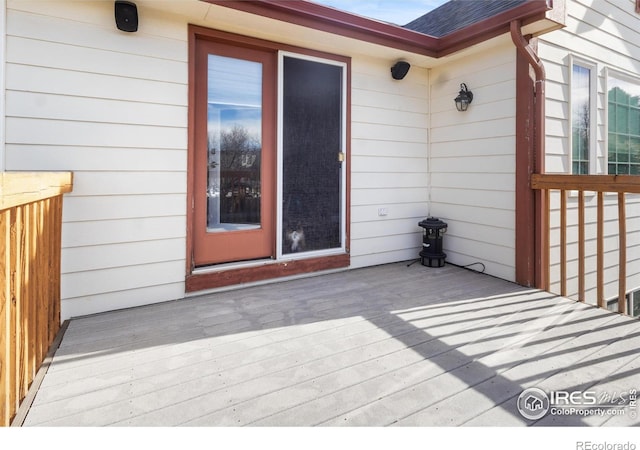 doorway to property featuring a deck