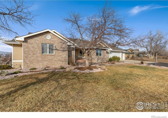 single story home with a garage and a front yard