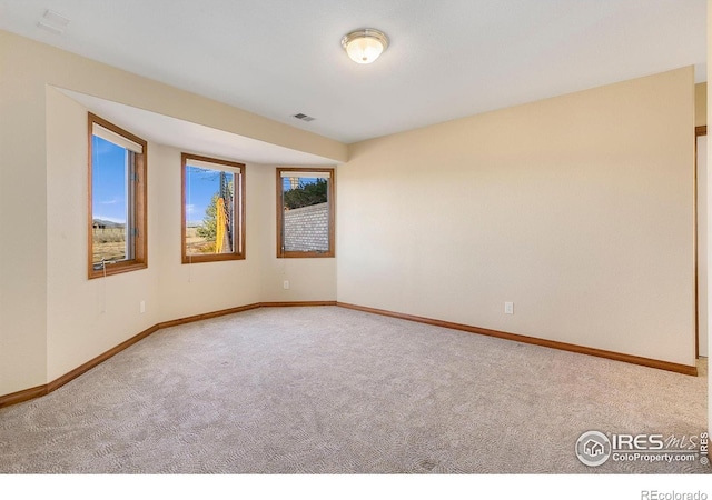 view of carpeted spare room