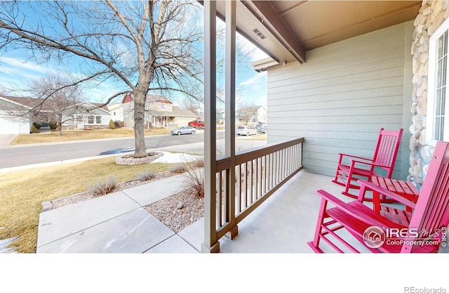 view of patio featuring a porch