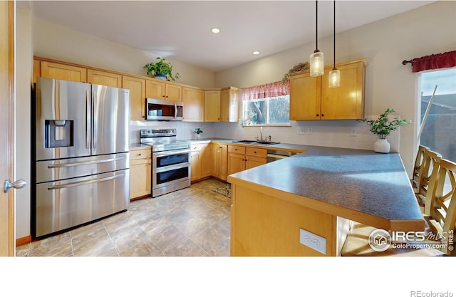 kitchen with pendant lighting, sink, backsplash, stainless steel appliances, and light brown cabinets