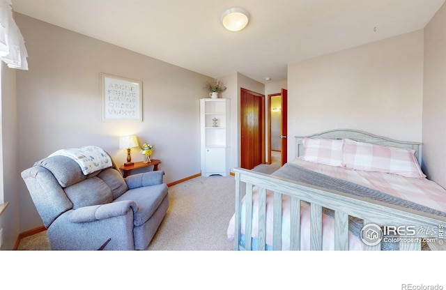 bedroom featuring light colored carpet