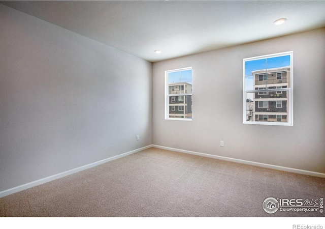 view of carpeted spare room