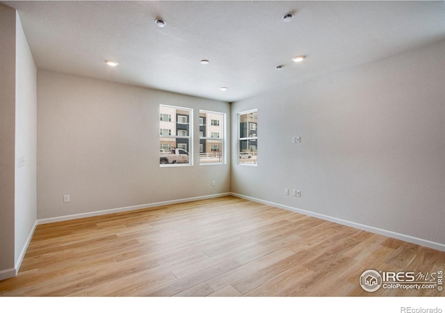 empty room featuring light wood-type flooring