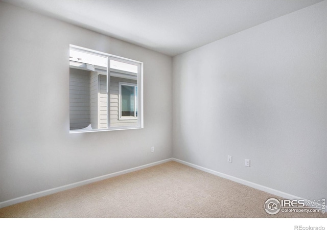 view of carpeted spare room